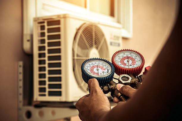 Professional Hvac technician working in Isanti, MN
